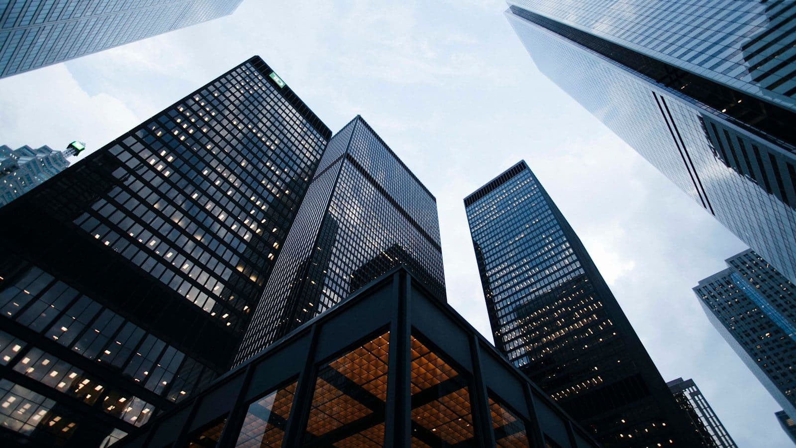 Modern corporate skyscraper against blue sky