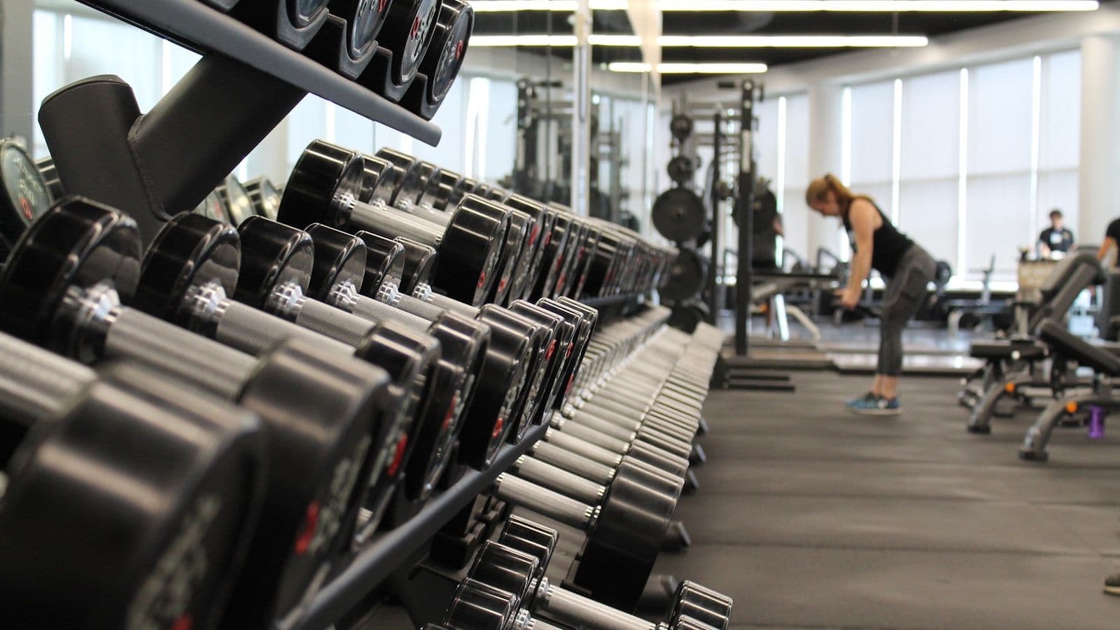 Modern gym with weights and exercise equipment